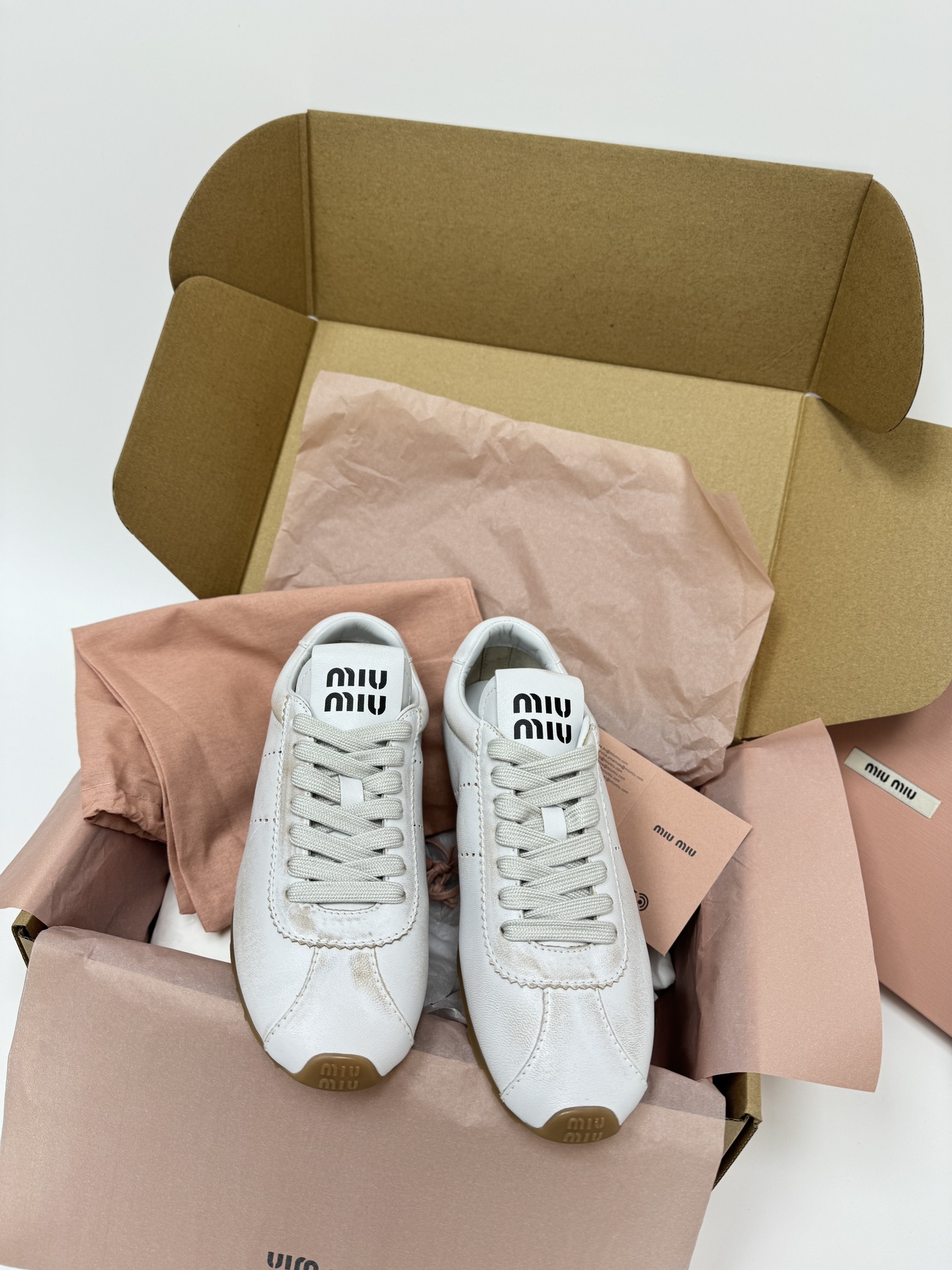 Miu 스니커즈