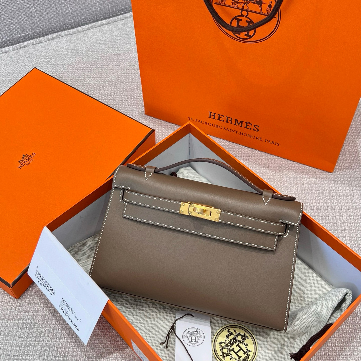 에르메스 Hermes Kelly Pochette Swift 18 Etoupe/silver