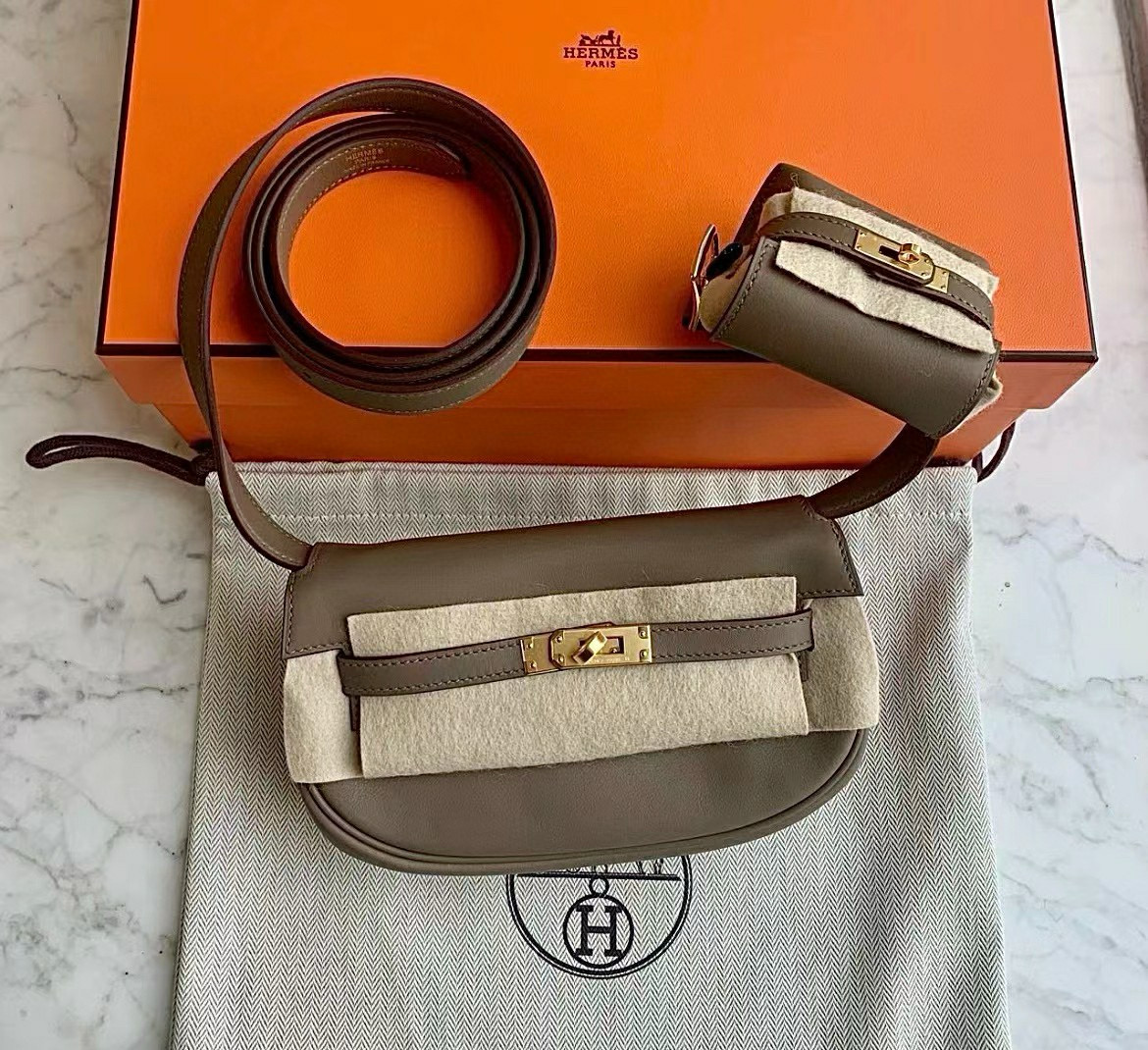 에르메스 Hermes Kelly Moove Swift 18 Etoupe/gold